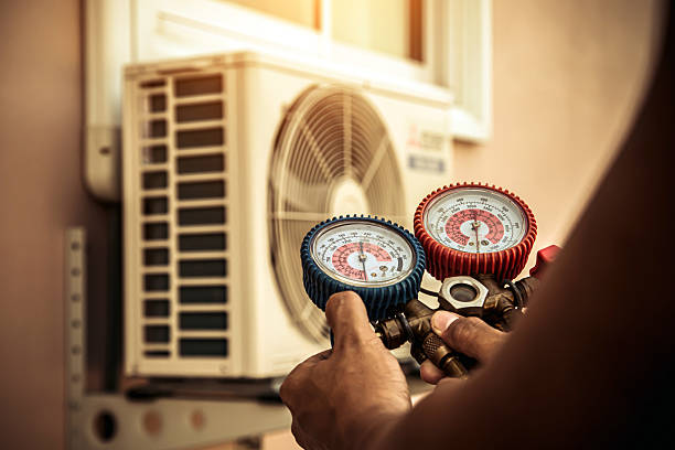 Professional Ductwork Repair technician working in Sharon, MA
